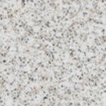 A close up of the surface of a white granite slab.