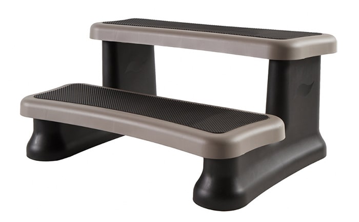 A step stool that is sitting on top of a table.