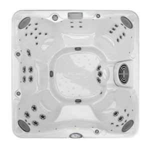 A white spa with black accents and chrome handles.