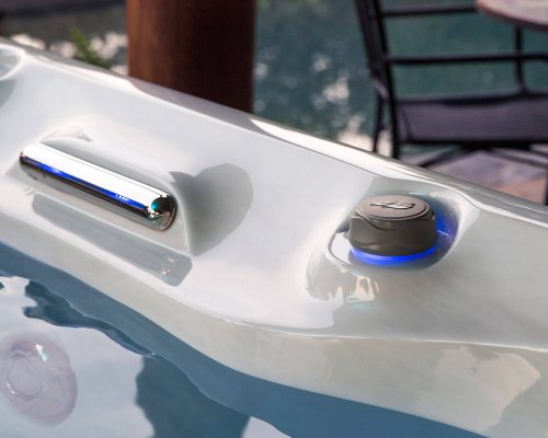 A close up of the water fountain on top of a table. A close up of the water fountain on top of a table.